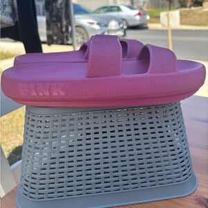 Pink name brand Slides